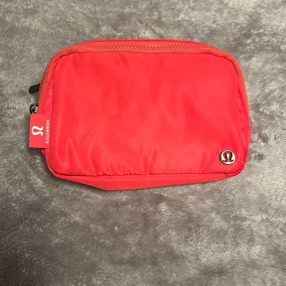 Red lululemon belt bag